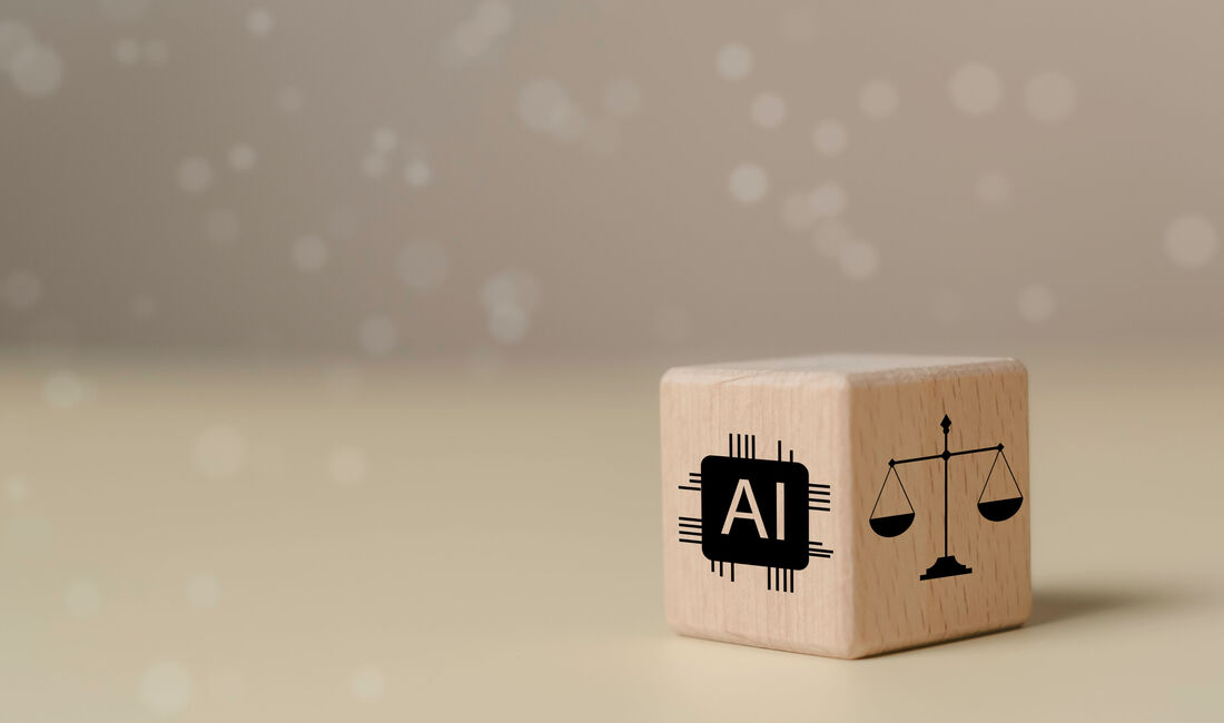 © The KonG - stock.adobe.com Wooden block featuring AI chip icon and legal scale